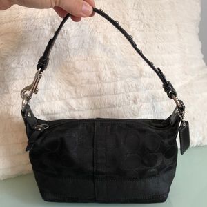 COACH black small studded wristlet bag